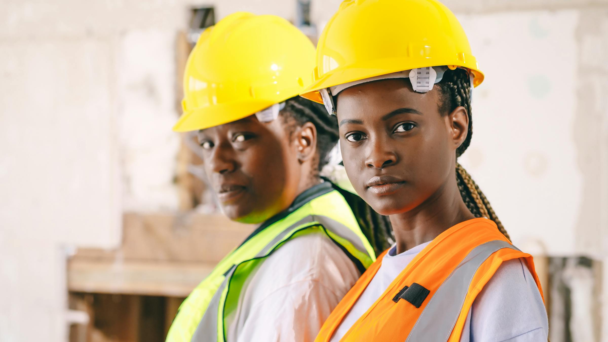 HSE professional in hardhat and high-visibility vest