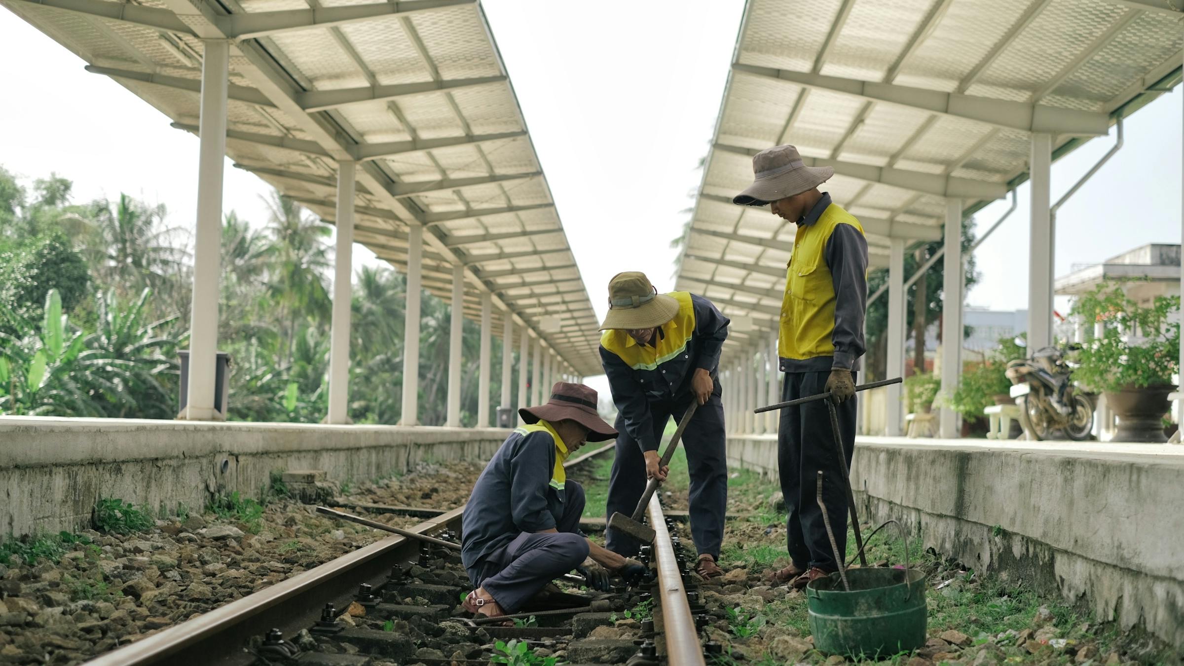Railway maintenance crew working in protective safety gear